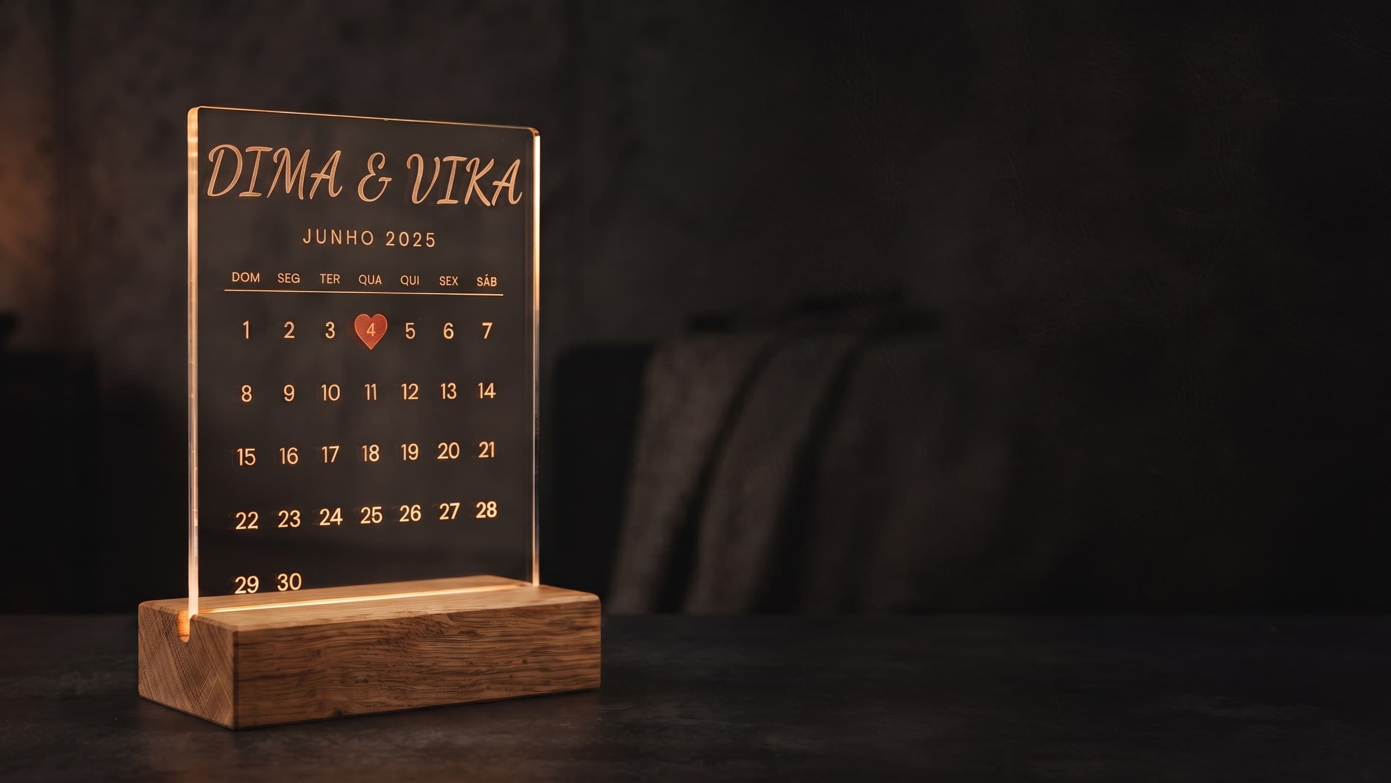 LED calendar glowing on a bedside table
