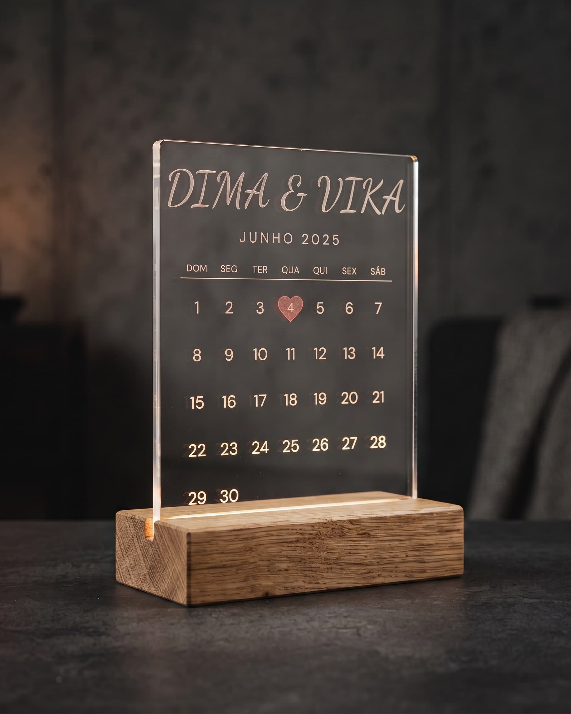 Emotional LED calendar lit with the couple's names and the marked date