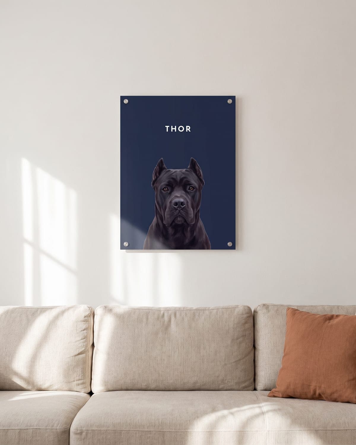 Pet Portrait of a dog on a midnight blue background, acrylic with metal standoffs, on the wall above a linen sofa